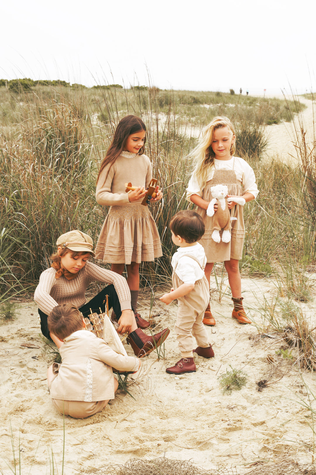 2512CA-BB GIRL ROMPER W SMOCKING-CAMEL