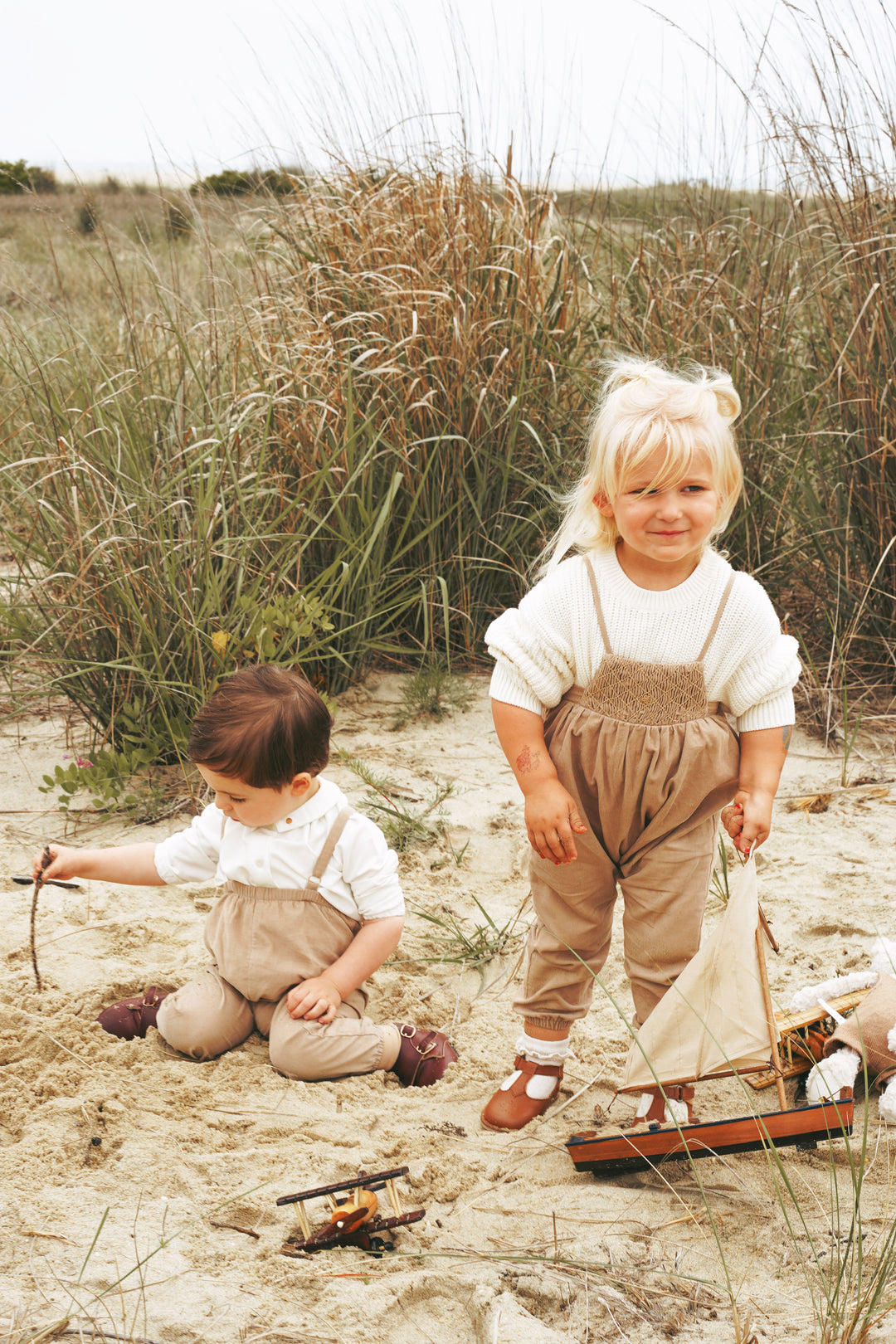 2512CA-BB GIRL ROMPER W SMOCKING-CAMEL