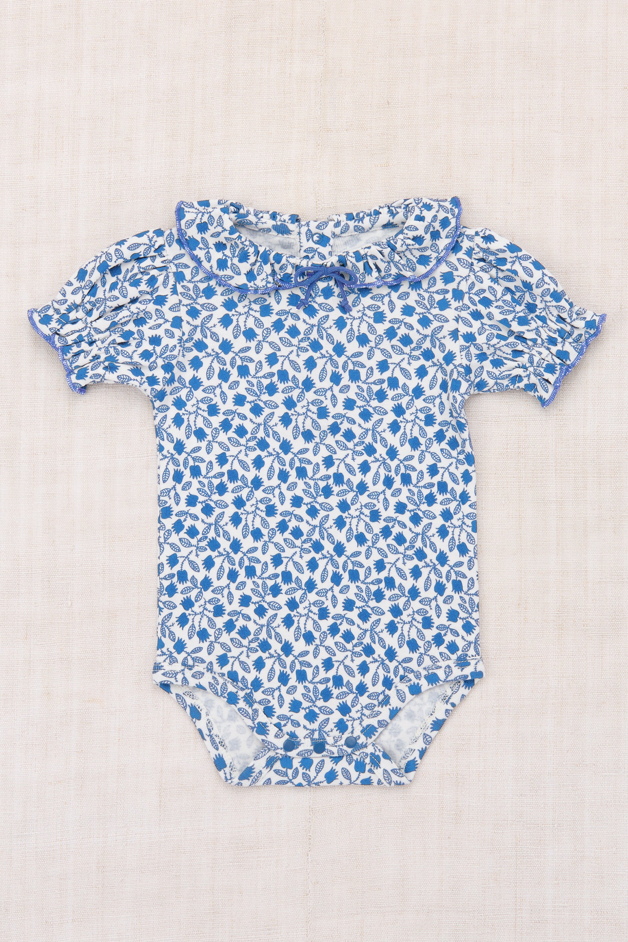 BABY PATRICIA ONESIE-BLUE RIBBON LISSE FIELDS – whoopikids