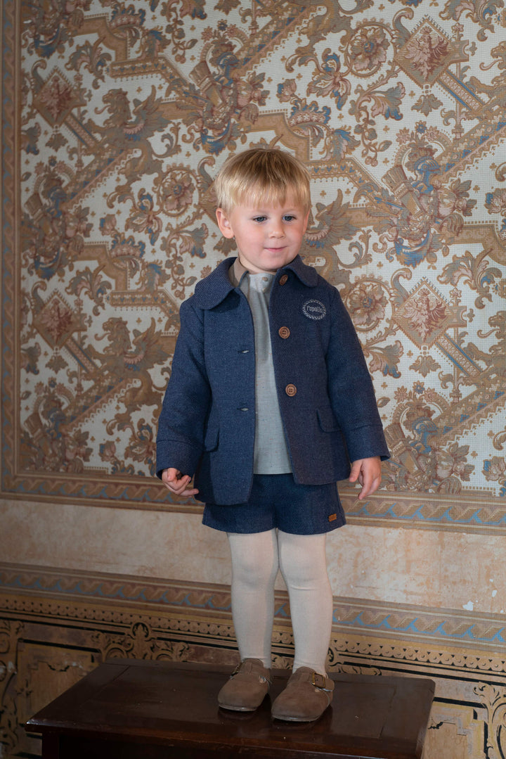 MOD.20.2 GREY HERRINGBONE PANELLED BLOUSE IN ALL HERRINGONE FABRIC COLLAR SLEEVES WRISTS AND ALL PIPING IN BLUE