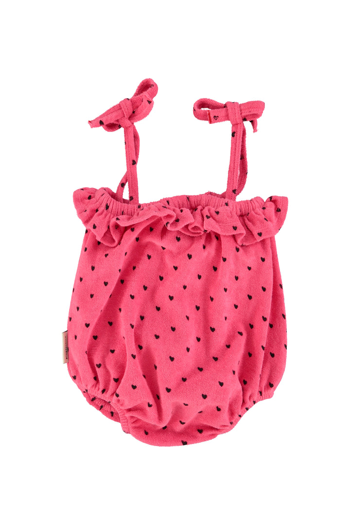 SS26.JRS2602-BABY ROMPER W/ RUFFLES - PINK W/ BLACK HEARTS ALLOVER