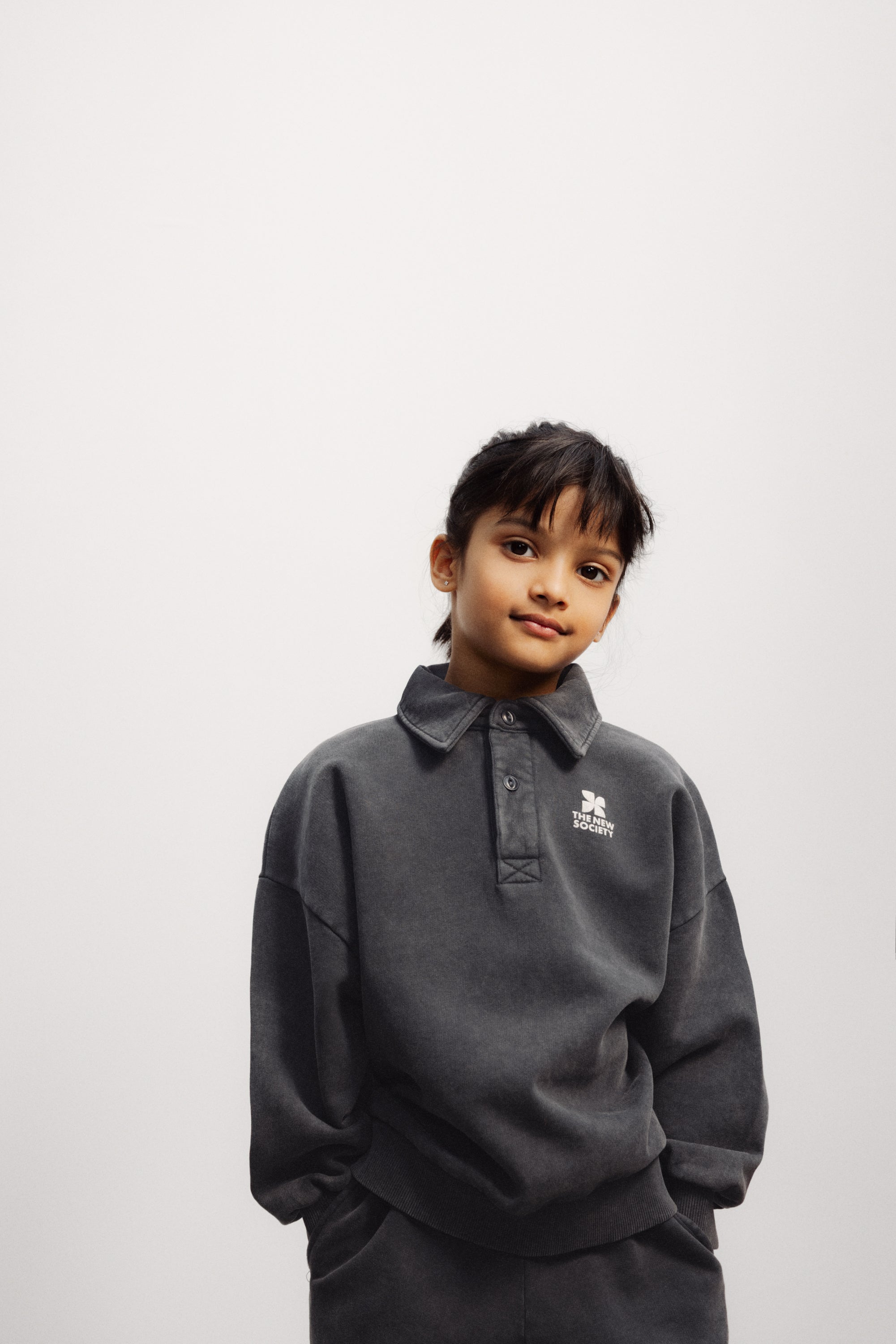 W26KPOL126 TNS Logo Polo Forged Iron – whoopikids