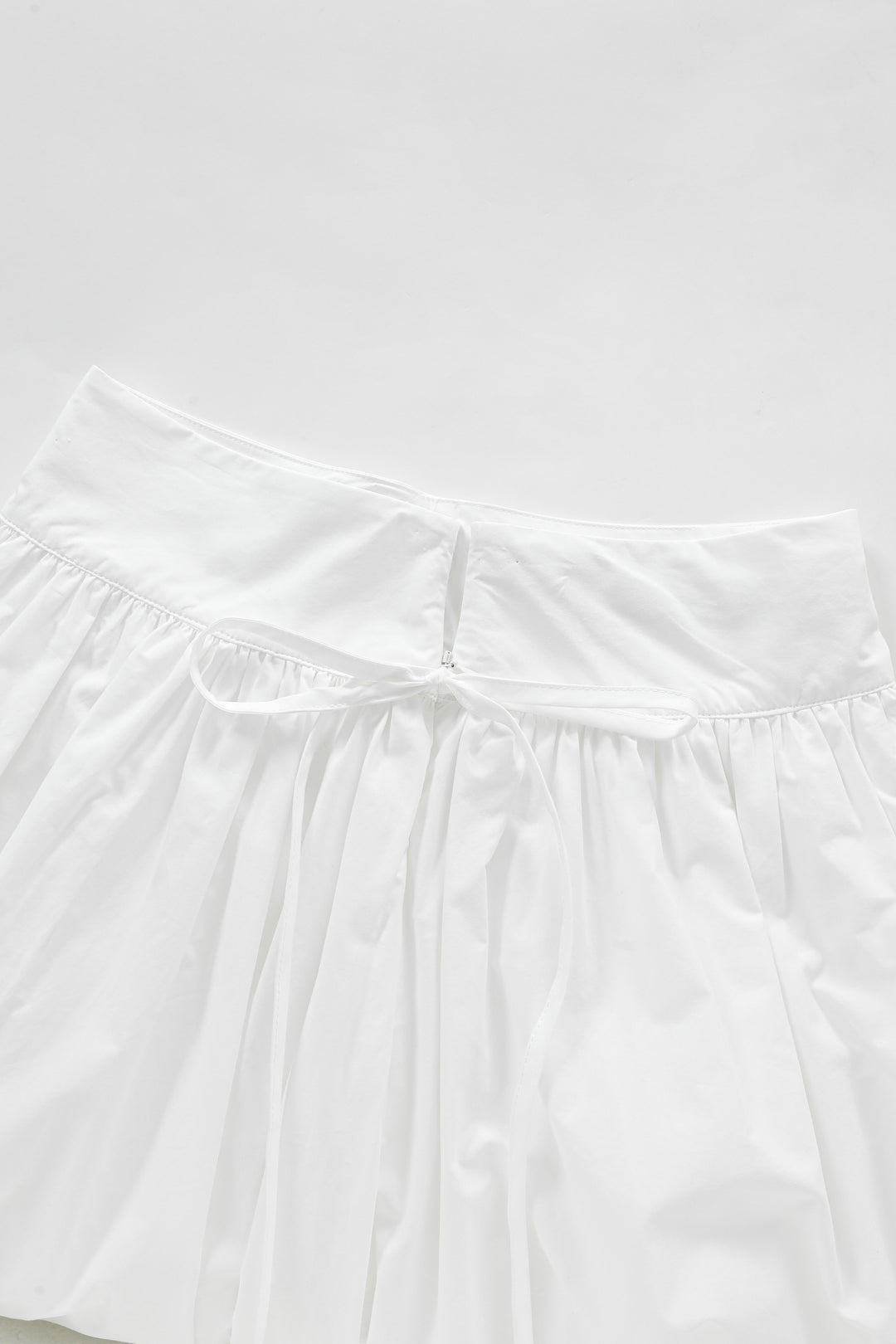 MIDI CIRCLE SKIRT WITH SIDE TIE-WHITE